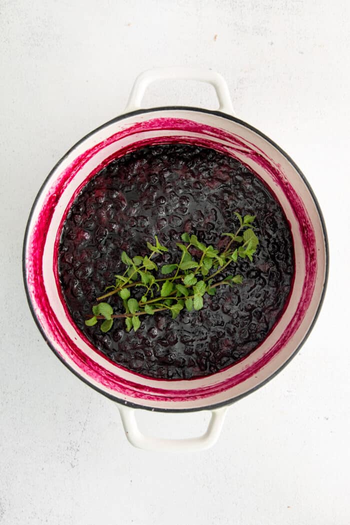 Mint steeping in blueberry jam