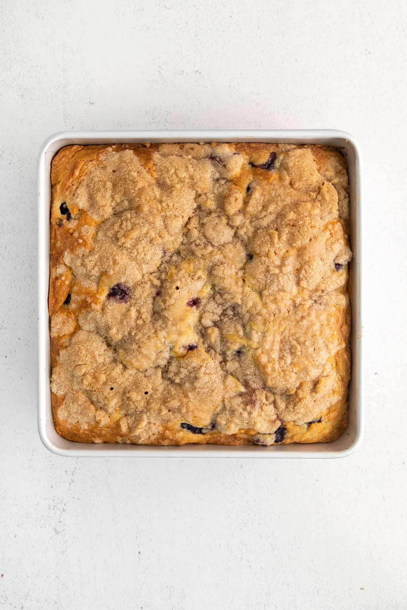 A freshly baked blueberry tea cake