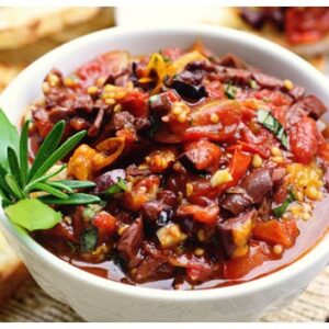 a bowl of roasted tomato tapenade