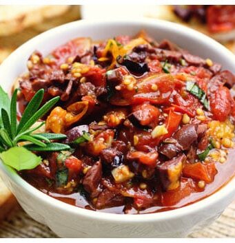 a bowl of roasted tomato tapenade