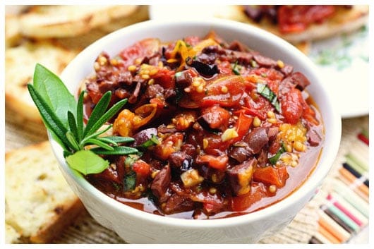 a bowl of roasted tomato tapenade