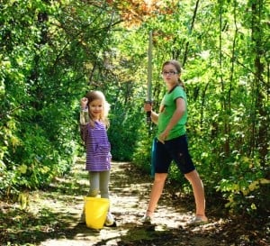 two girls on a park trail