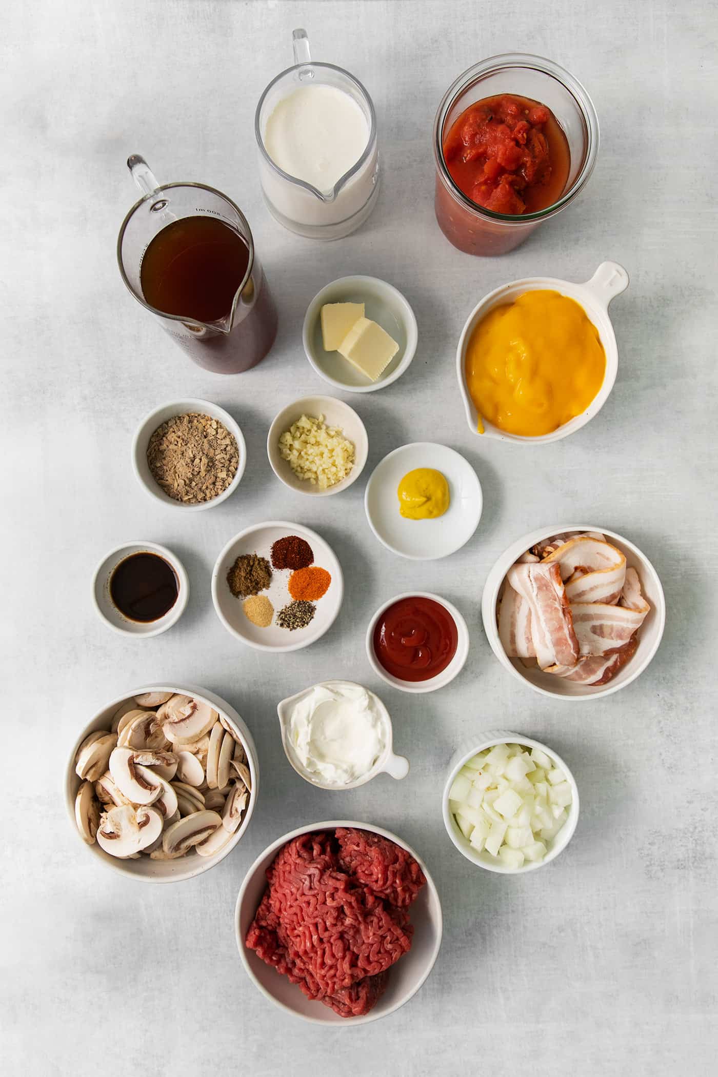 Overhead view of ingredients for bacon cheeseburger soup