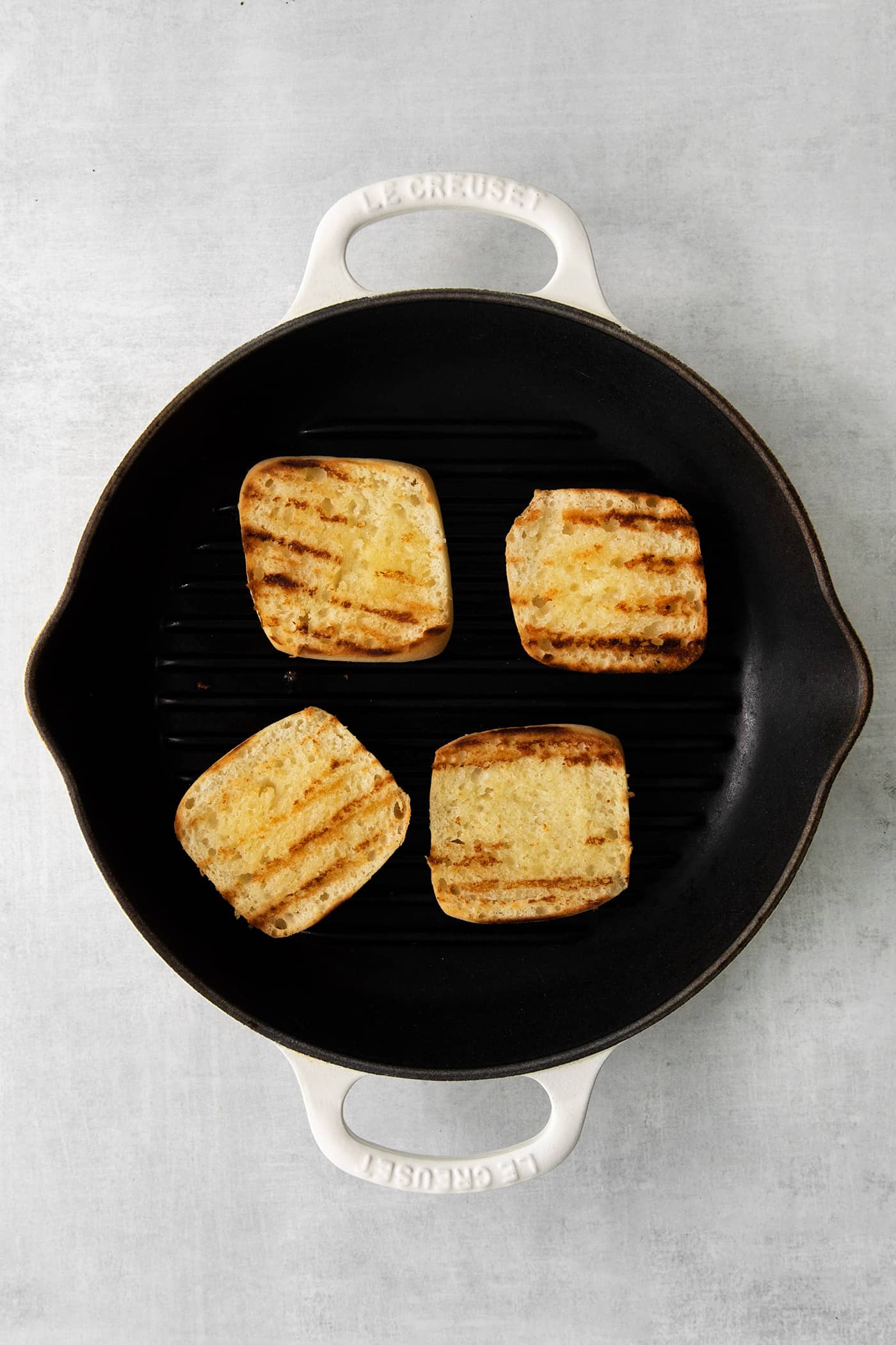 Toasted buns in a skillet