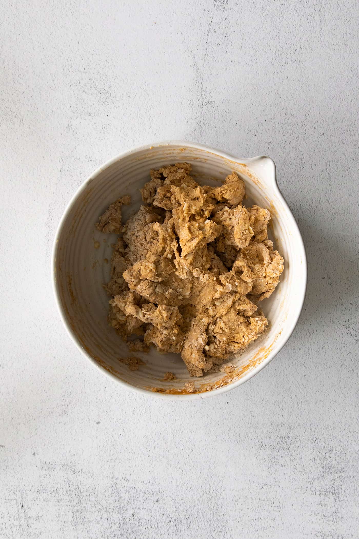 Pumpkin biscuit dough in a bowl