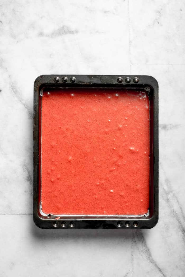 Overhead view of brownie batter in pan