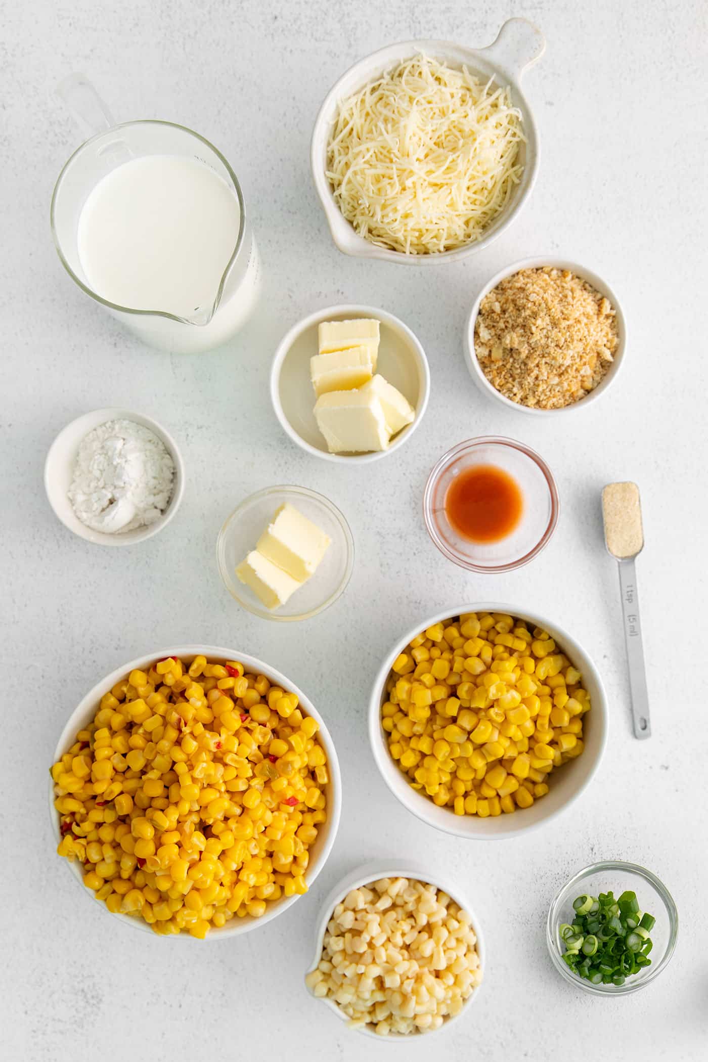 overhead view of skillet scalloped corn ingredients