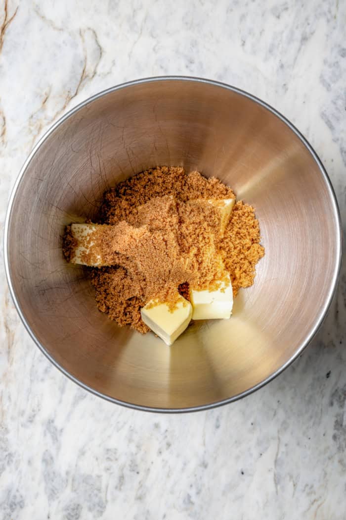 Brown sugar and butter in mixing bowl