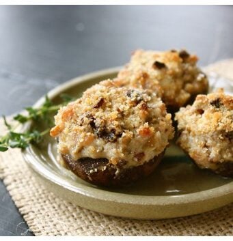 A plate of cheesy stuffed mushrooms