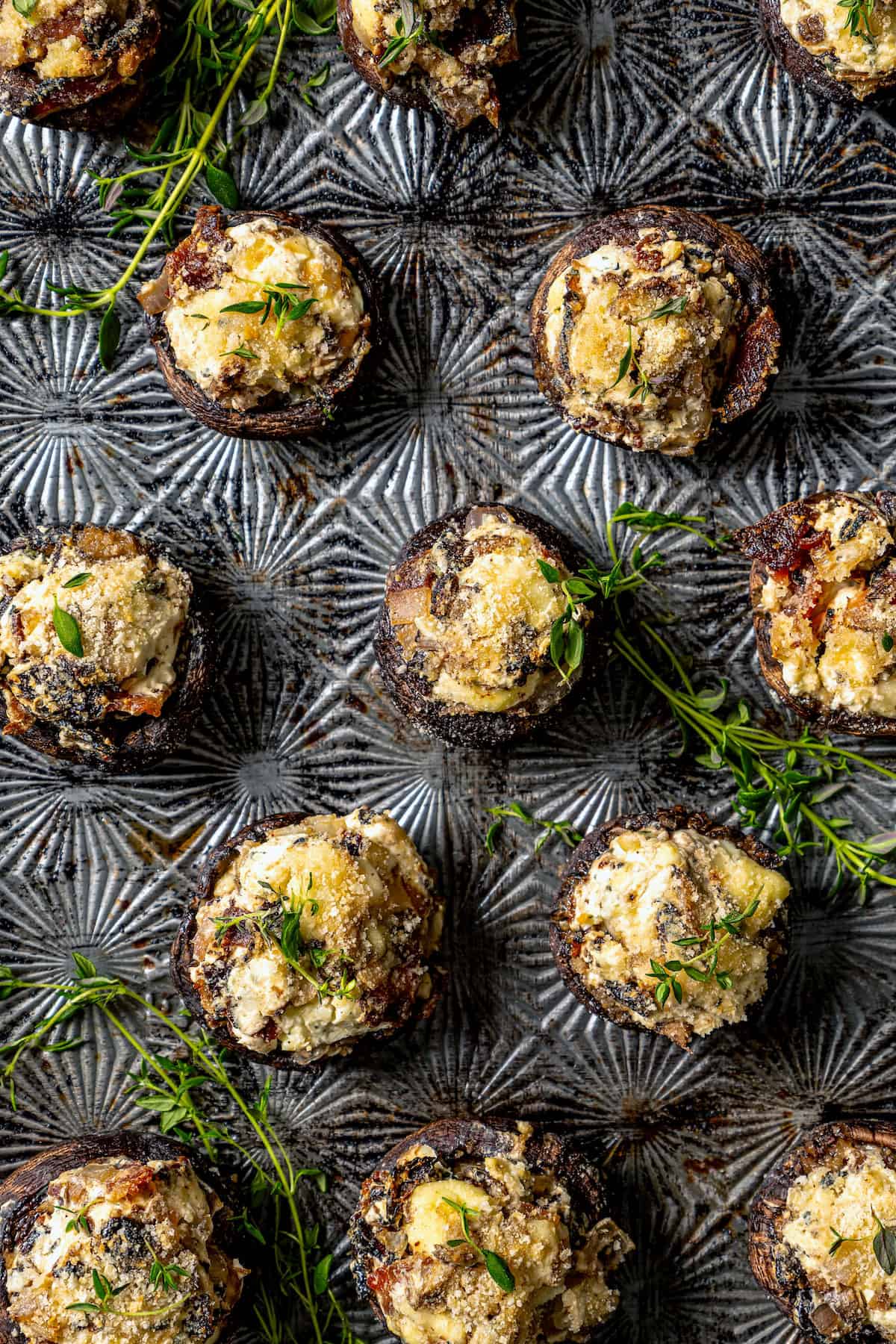 Overhead view of stuffed mushrooms with bacon and blue cheese