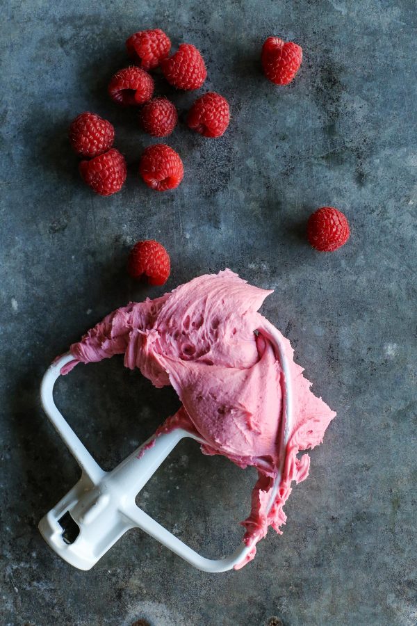 fresh raspberry buttercream on a mixing beater