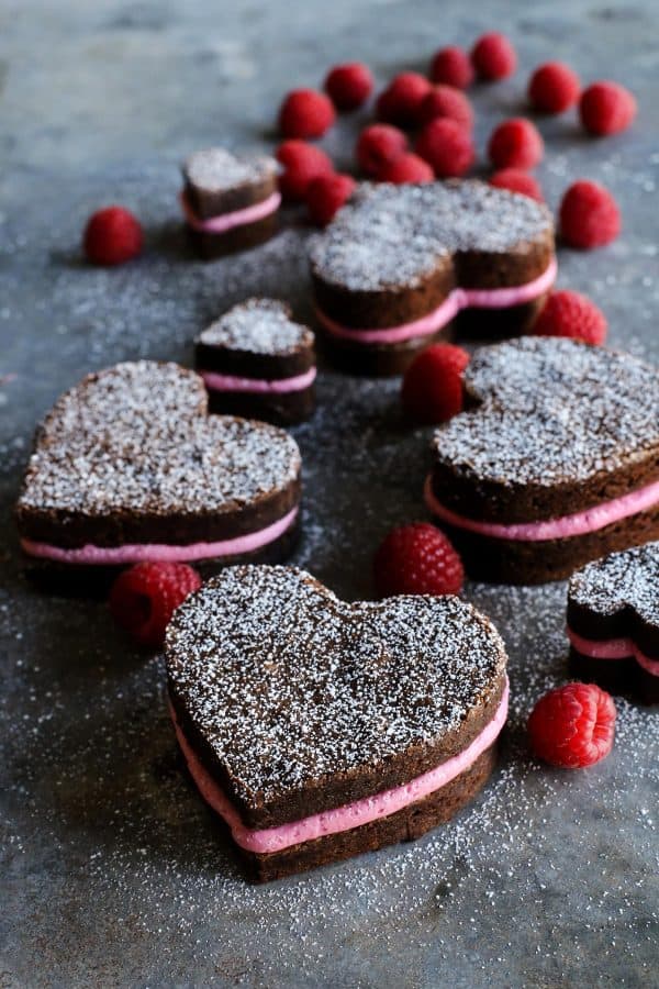 heart-shaped brownies sandwiching raspberry buttercream