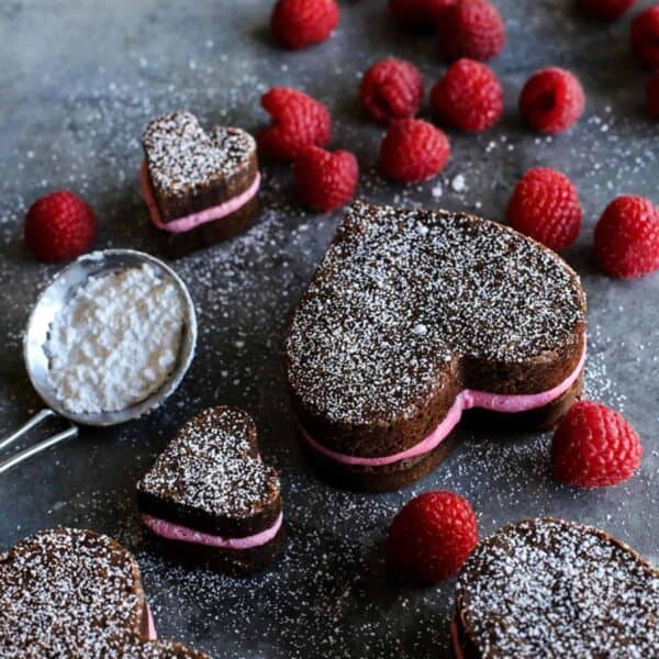 brownies cut into hearts with real raspberry buttercream