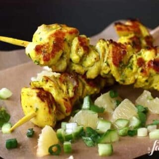 grilled chicken kebabs with a side of lemon salsa