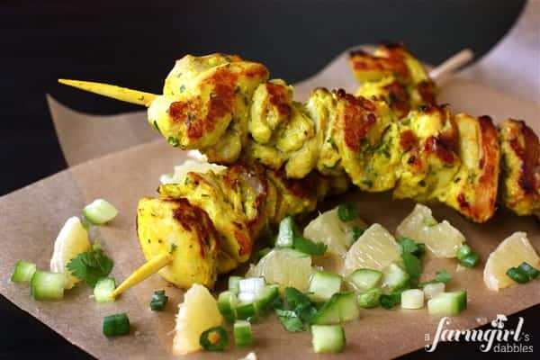 grilled chicken kebabs with a side of lemon salsa