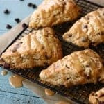 These chocolate chip scones are flaky and topped with peanut butter glaze.