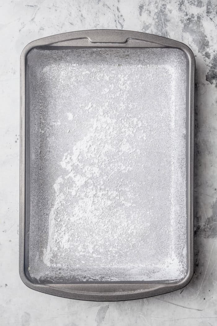 Overhead view of pan dusted with powdered sugar