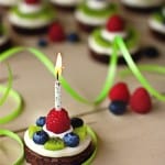 a brownie pie with a lit candle