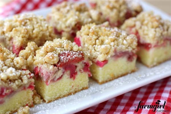 Strawberry Rhubarb Crumb Bars with a gingham cloth