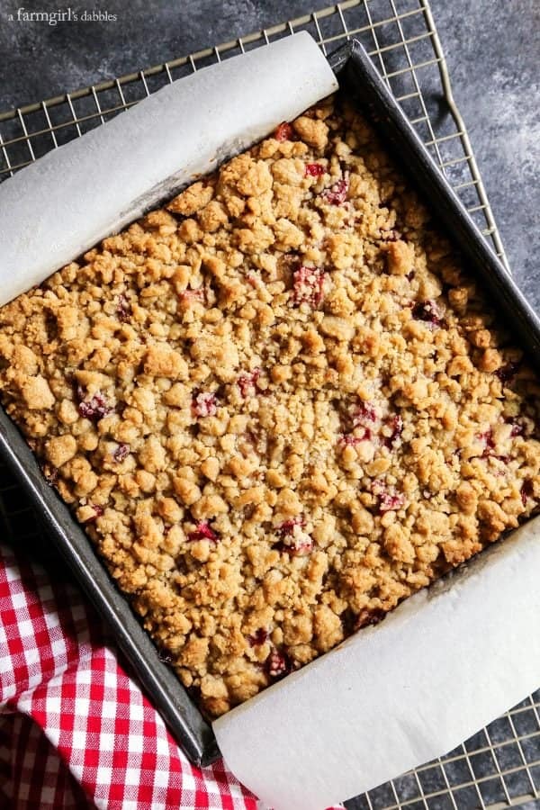 Strawberry Rhubarb Crumb Bars on a cooling rack