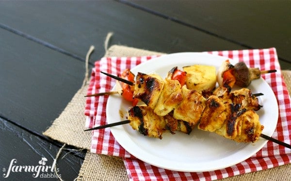 a white plate of Grilled Chicken Kebabs