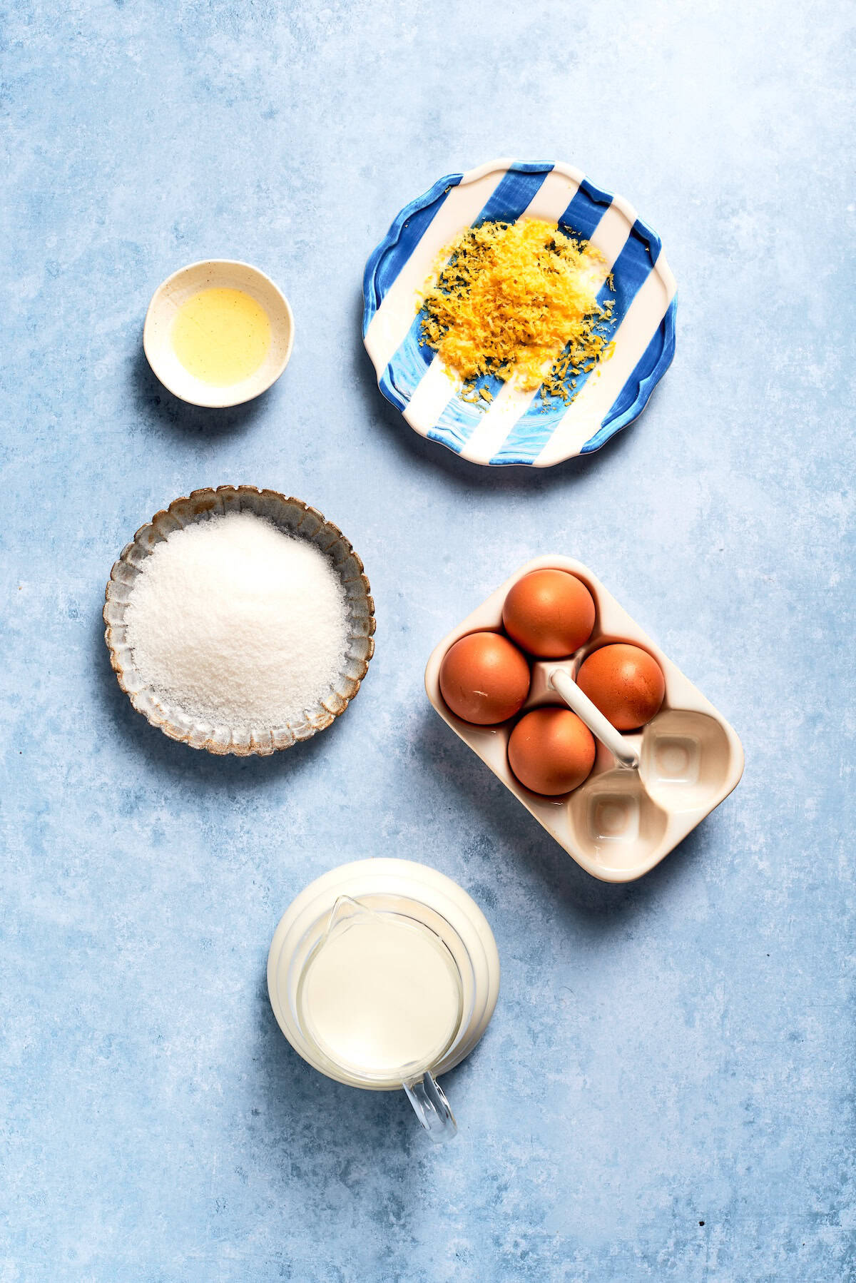 Overhead view of ingredients for lemon custard cups