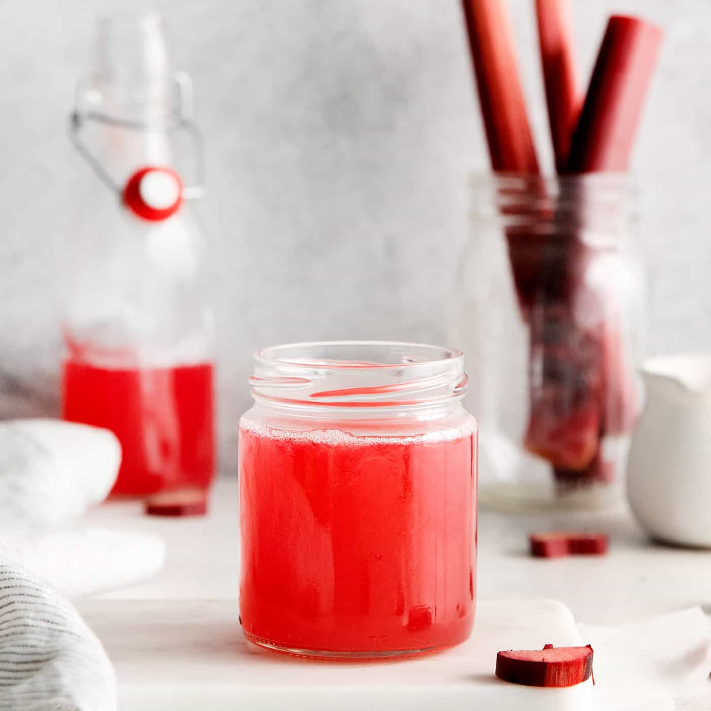 A small jar of rhubarb simple syrup