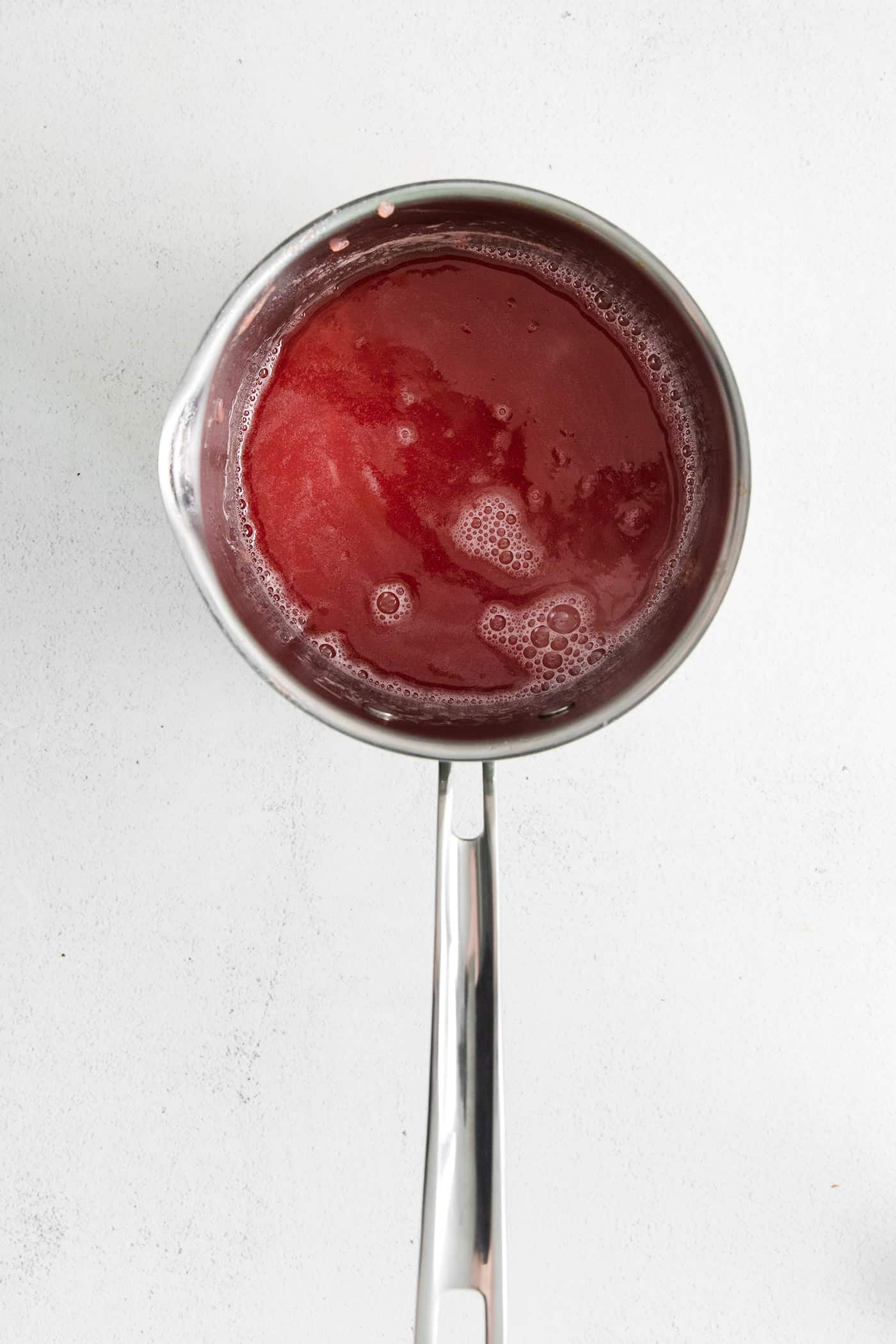 Rhubarb simple syrup in a saucepan