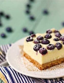 These cheesecake bars are so creamy and made with fresh blueberries and white chocolate.