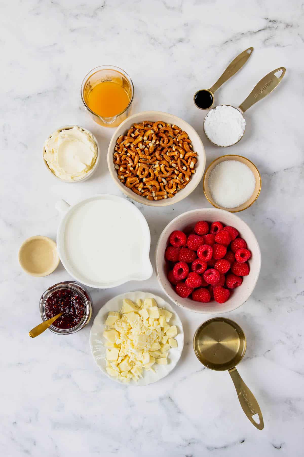 Overhead view of all the ingredients needed for frozen white chocolate raspberry dessert