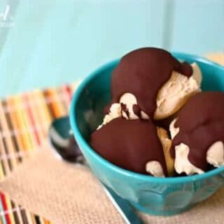 scoops of peanut butter ice cream topped with chocolate magic shell