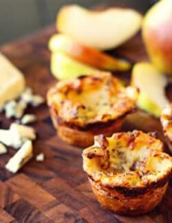 three blue cheese popovers with apple slices