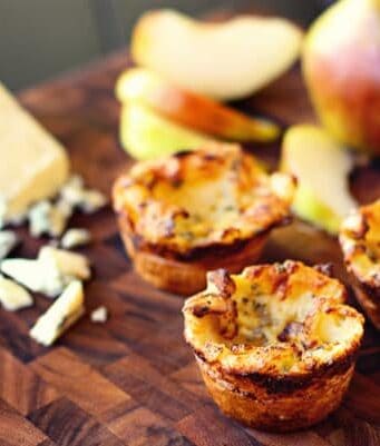 three blue cheese popovers with apple slices