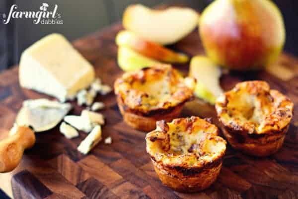 three blue cheese popovers with apple slices