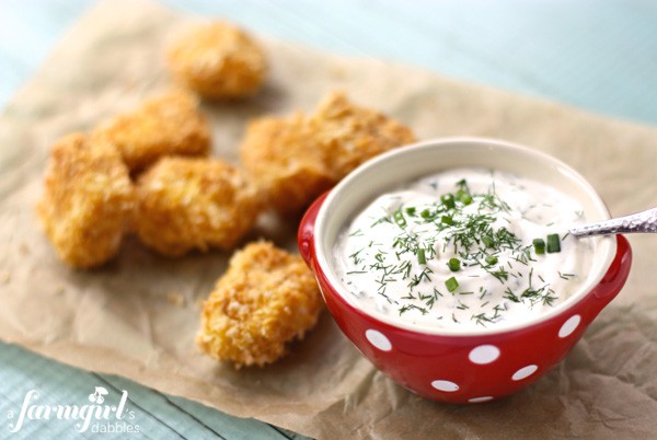 baked chicken nuggets with a dish of ranch dip