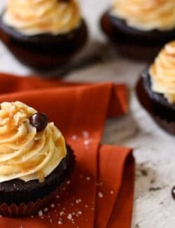 chocolate cupcakes with salted caramel buttercream and chocolate covered coffee beans