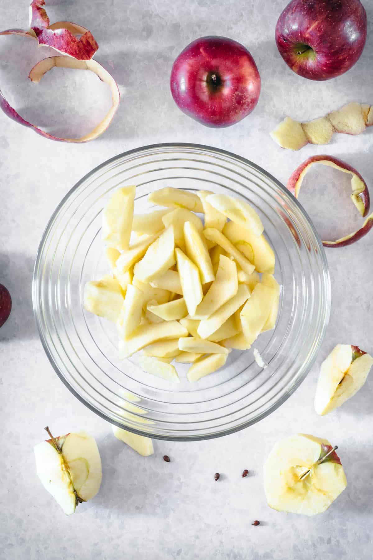 Apple slices in a glass serving dish