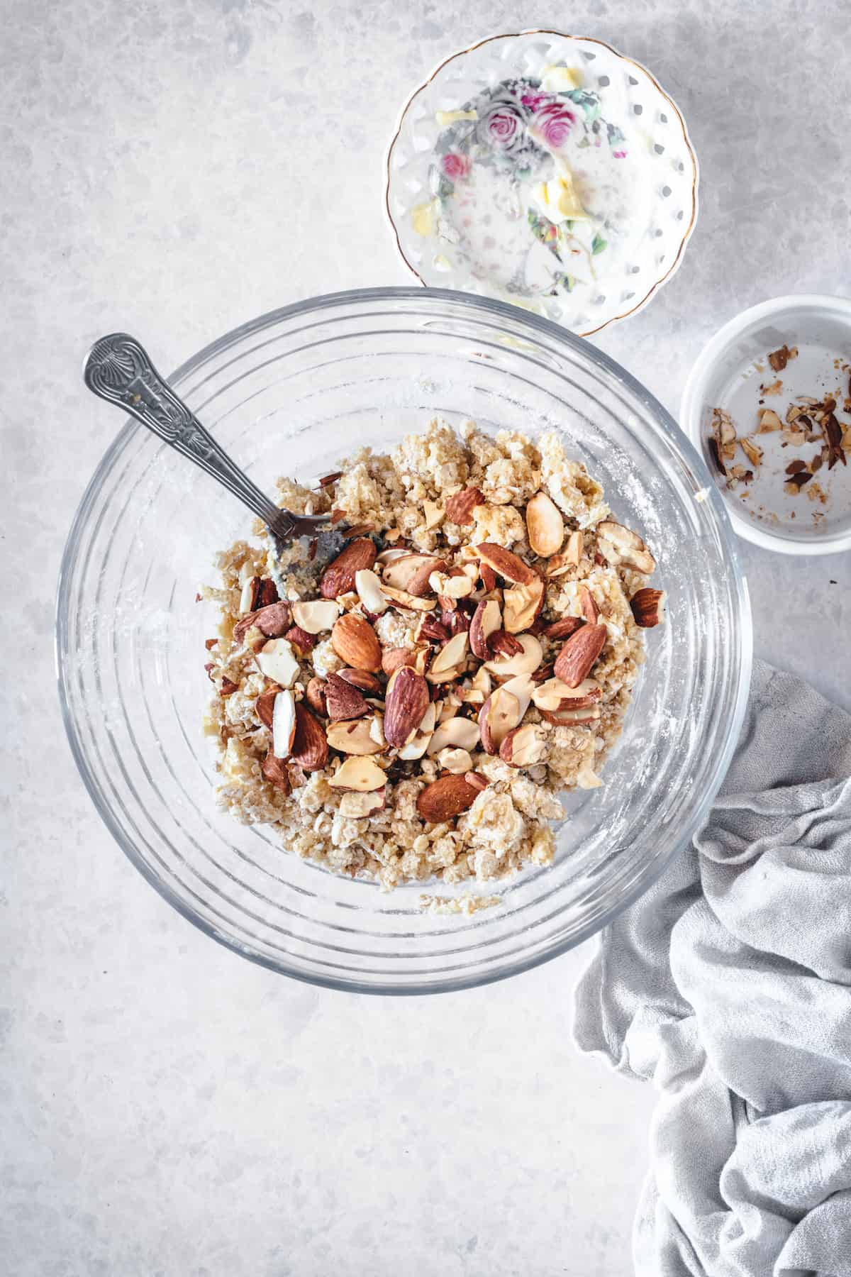 Almond crisp topping ingredients in a mixing bowl