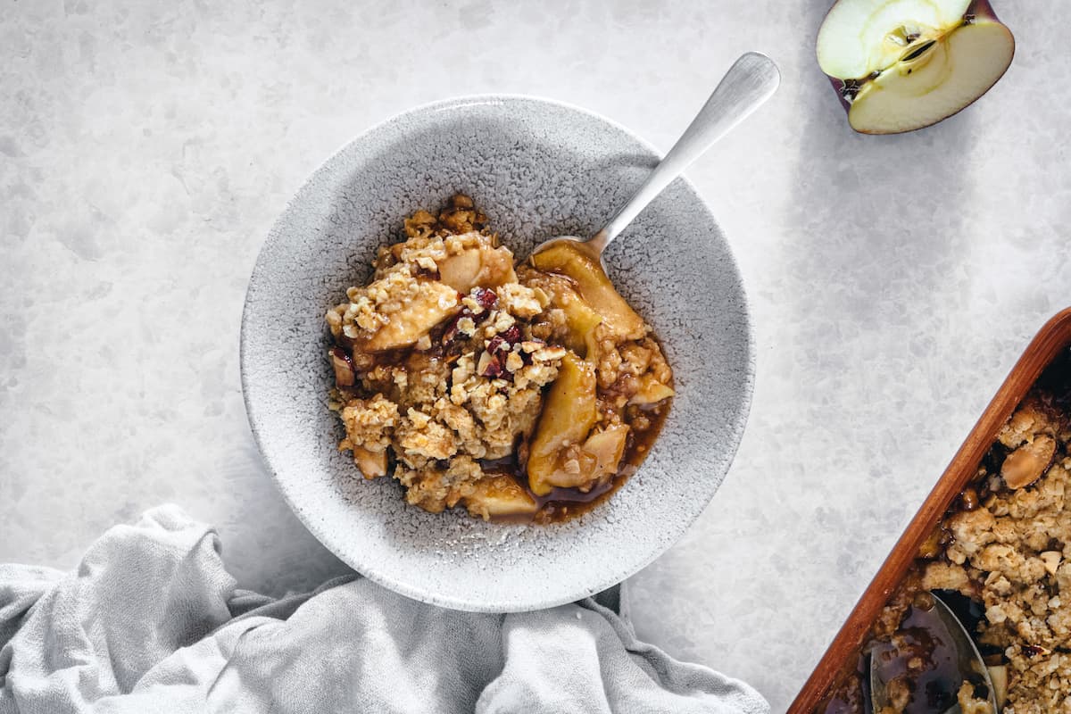 Caramel apple almond crisp in a bowl