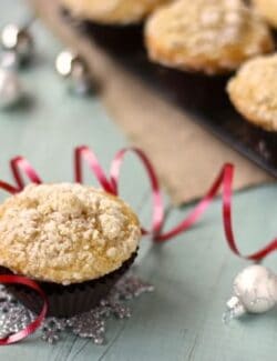 an eggnog muffin with christmas ornaments
