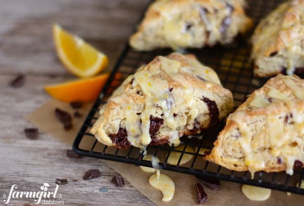 orange and dark chocolate scones topped with orange glaze 