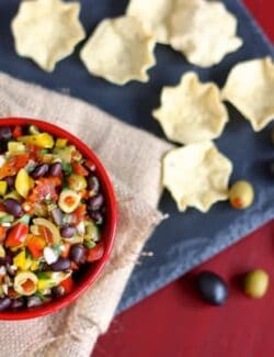 A Bowl of Black Bean Salsa Next to Some Tortilla Chips