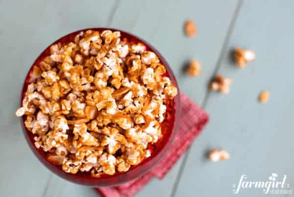 a red bowl of cinnamon caramel corn