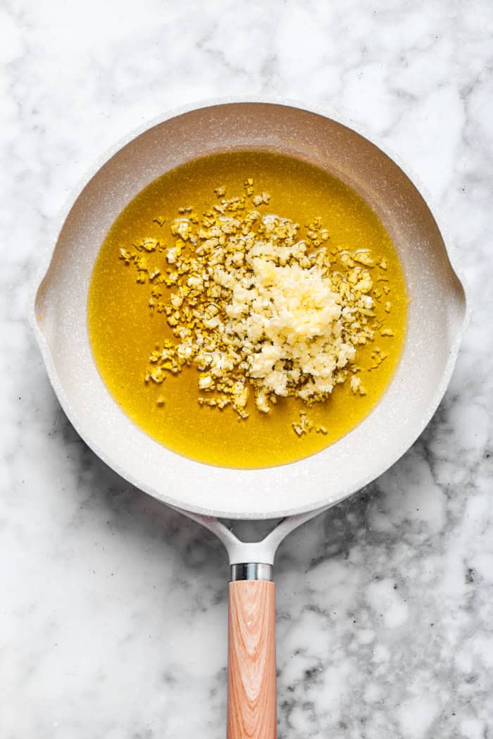 Garlic added to pan of olive oil