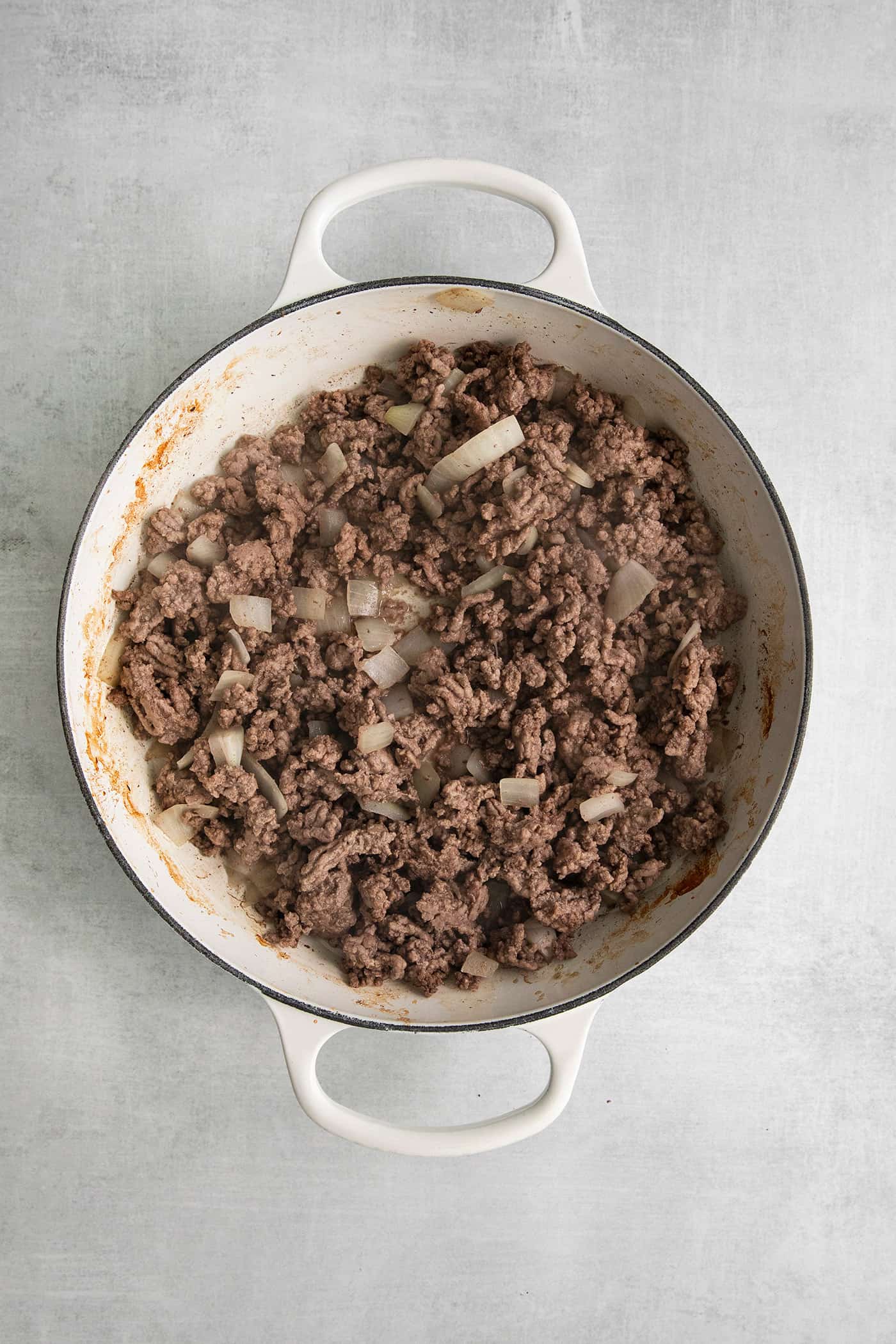 Cooked ground beef in a skillet