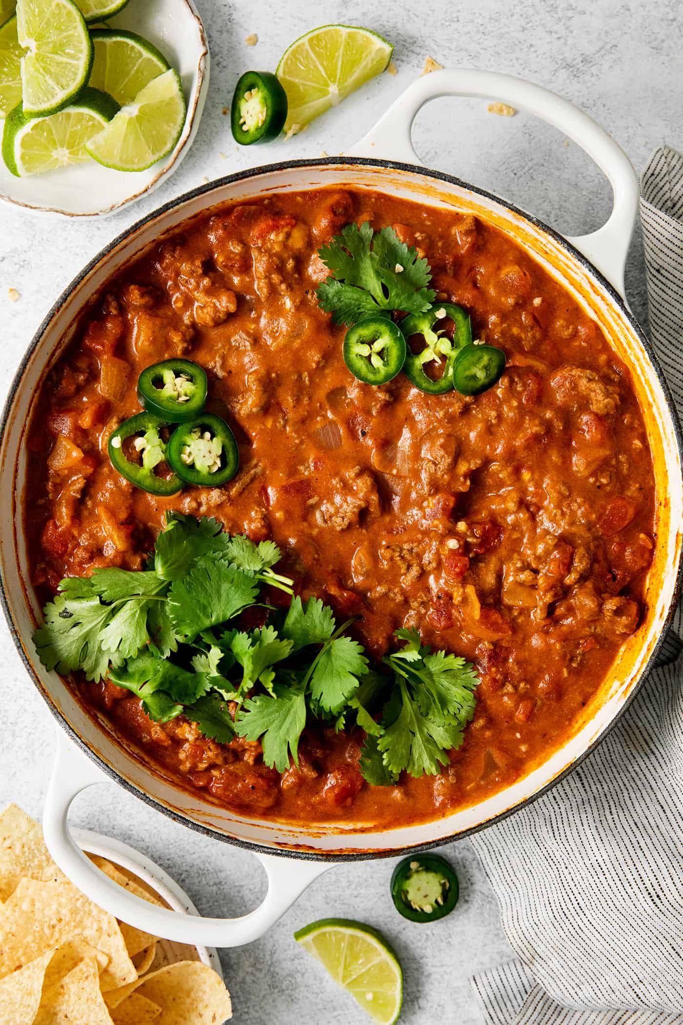 Cheesy taco dip with ground beef in a skillet