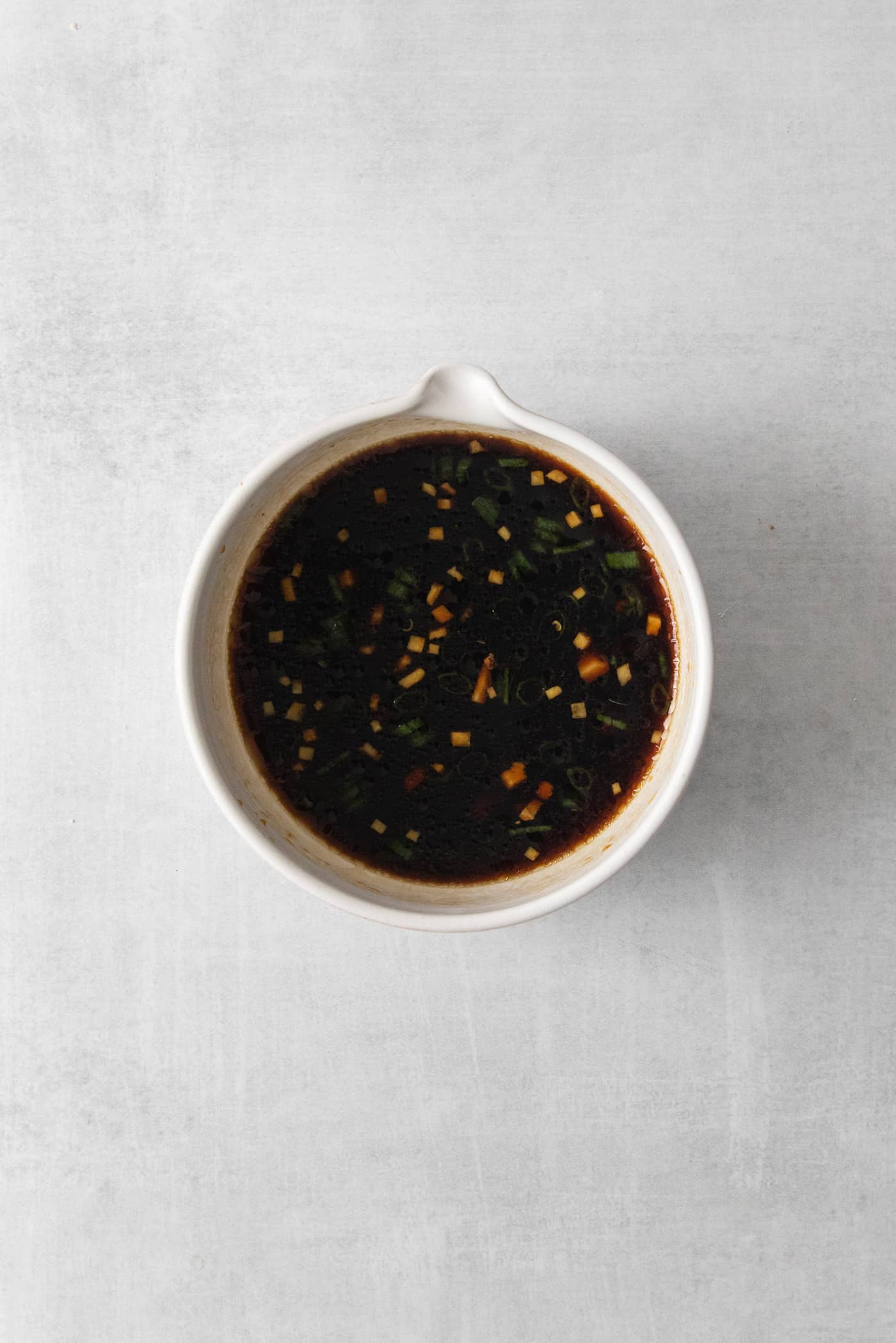 A bowl of potsticker dpping sauce