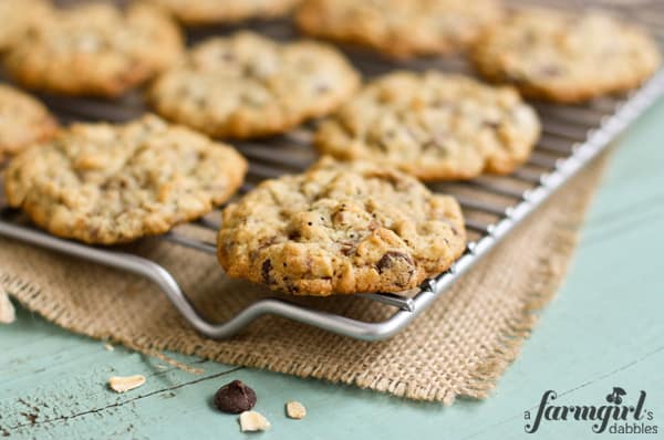 oatmeal cookies with toffee on a silver cooling rack