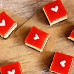 cheesecake squares on parchment paper