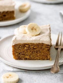 A slice of homemade banana cake on a plate